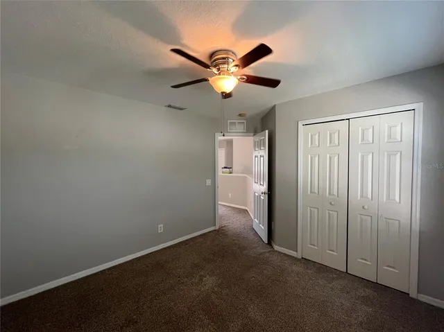 a view of empty room with windows