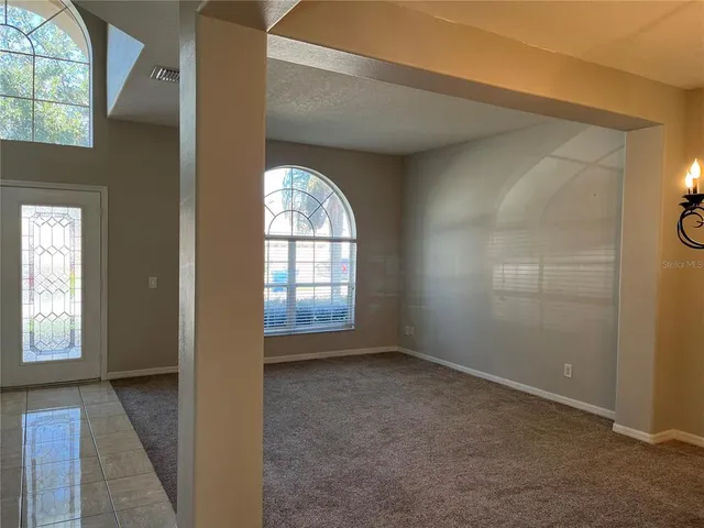 an empty room with windows