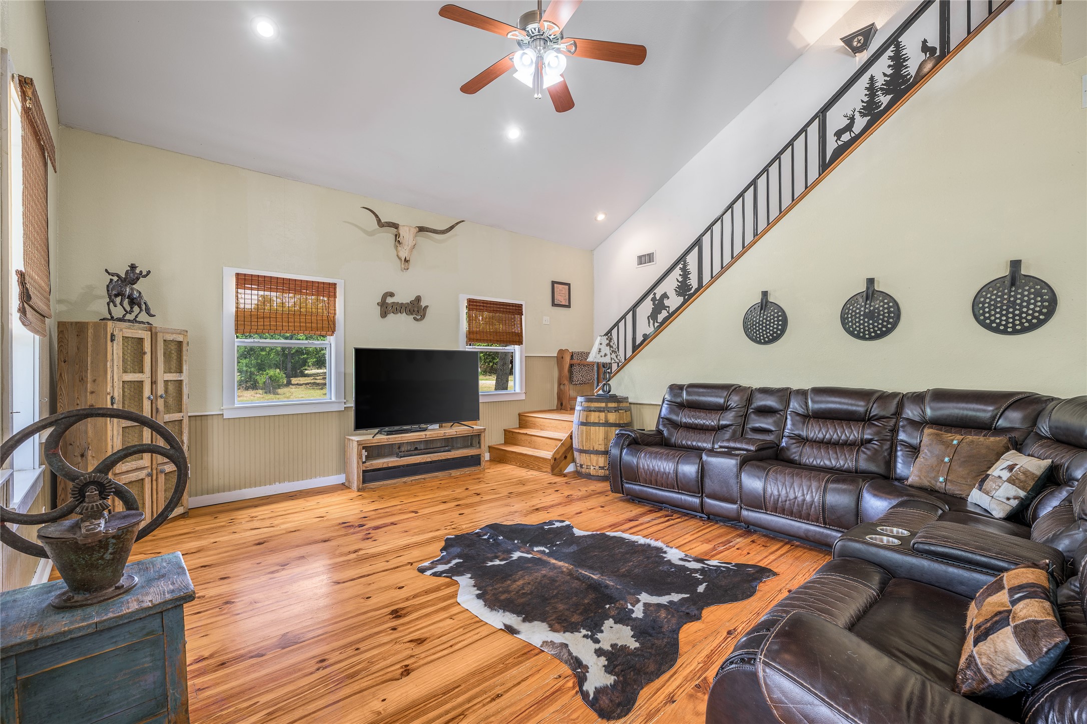 4310 Leslie Road Fayetteville, TX 78940 - Photo 9 of 22 a living room with furniture and a flat screen tv