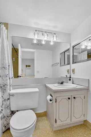 a bathroom with a shower and a bathtub