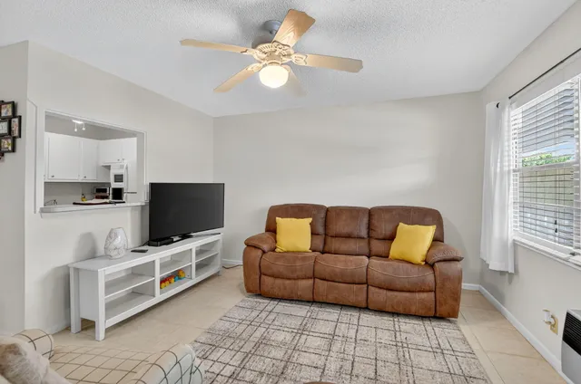 a view of room with closet and windows