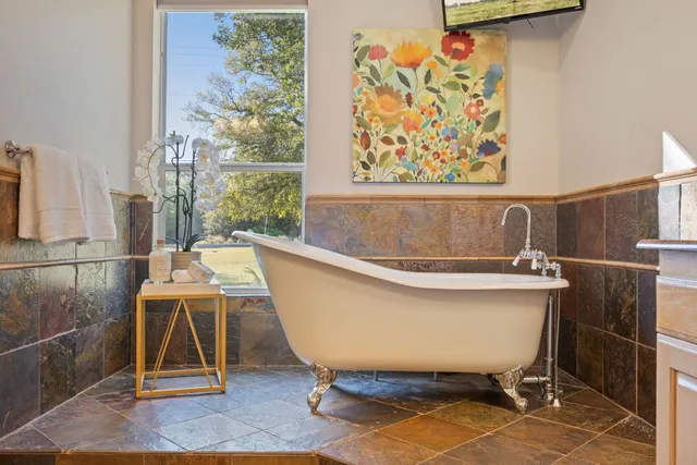 a view of a room with table and window