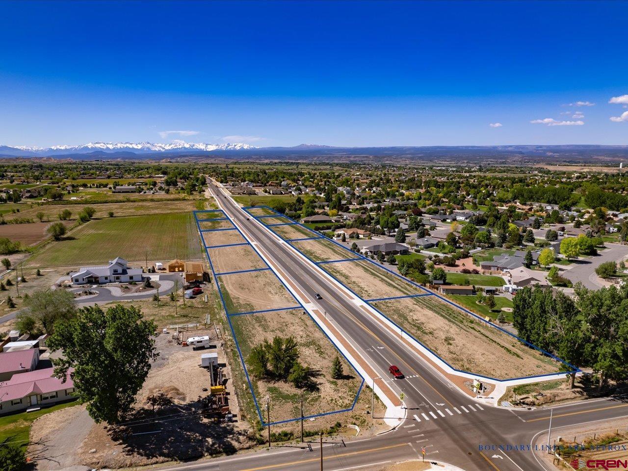 Lot 4 6700th Road Montrose, CO 81401 - Photo 3 of 8 a view of a city and a lake view