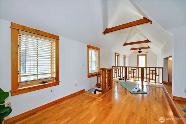 a view of a living room and a wooden floor