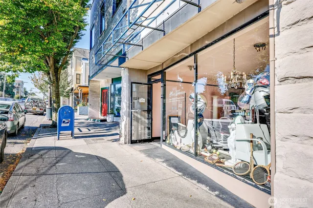a view of a store with a lot of signs