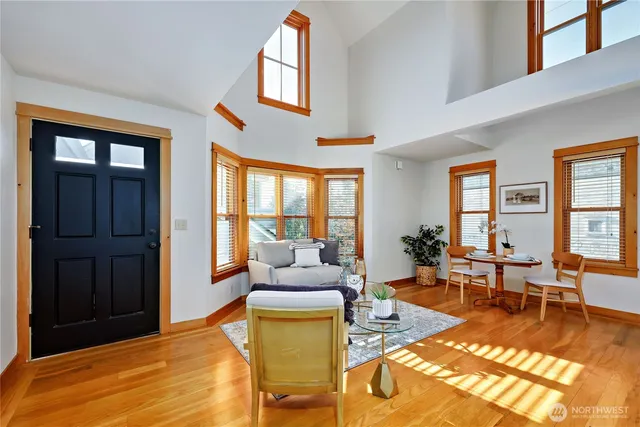 a living room with furniture and a table