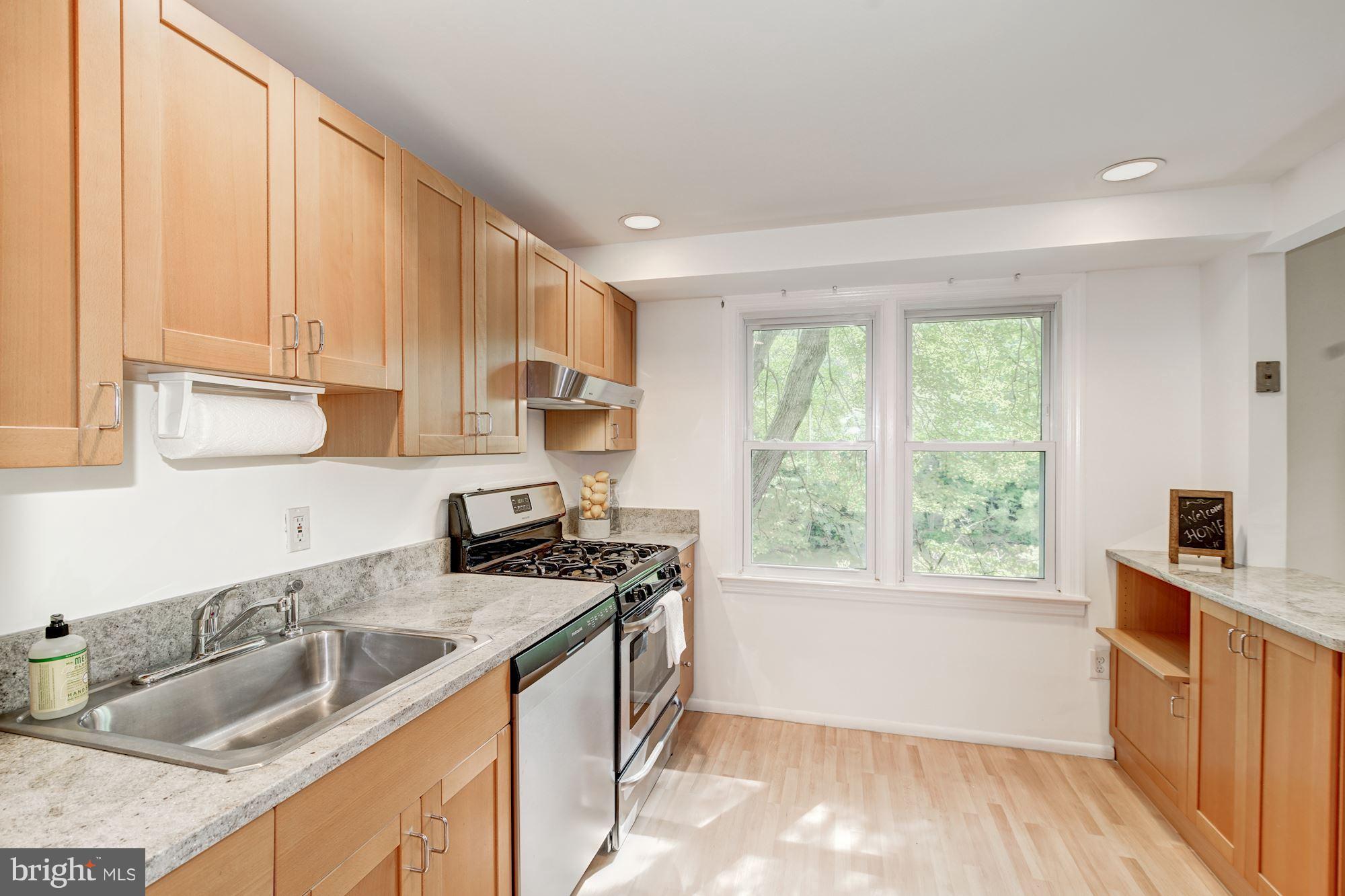 9506 Burdett Road Burke, VA 22015 - Photo 13 of 30 Kitchen features brand new granite counter tops.