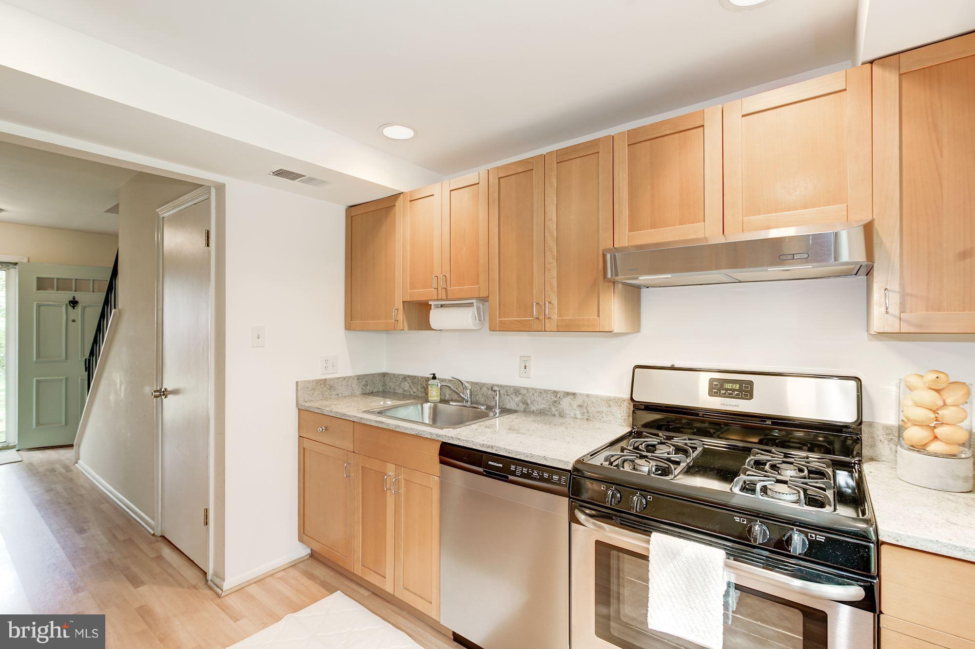 9506 Burdett Road Burke, VA 22015 - Photo 15 of 30 Check out the top of the line range hood.