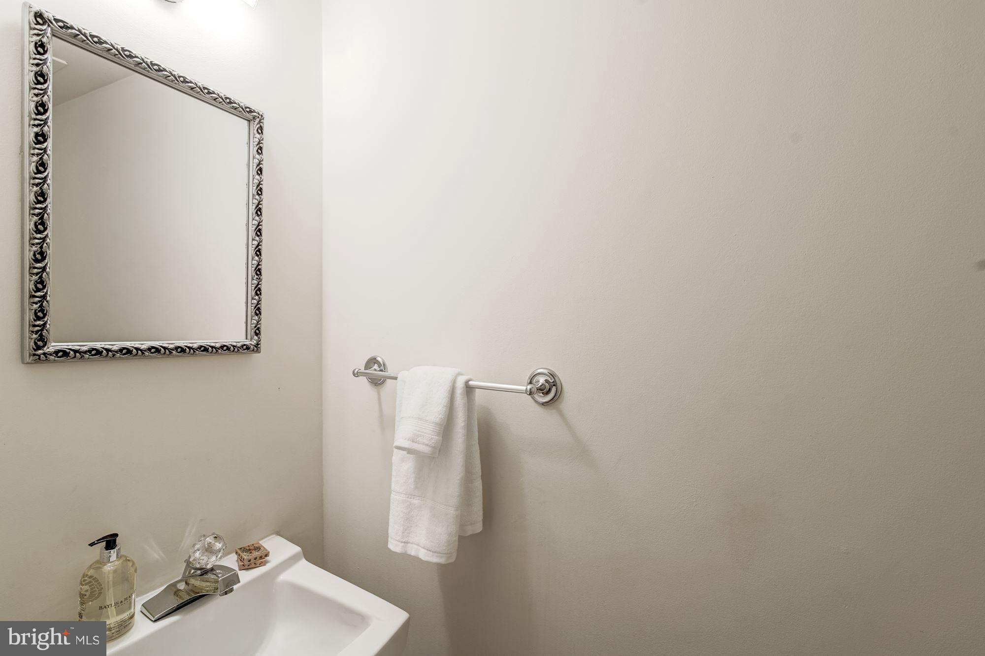 9506 Burdett Road Burke, VA 22015 - Photo 16 of 30 Powder room on main with brand new flooring.