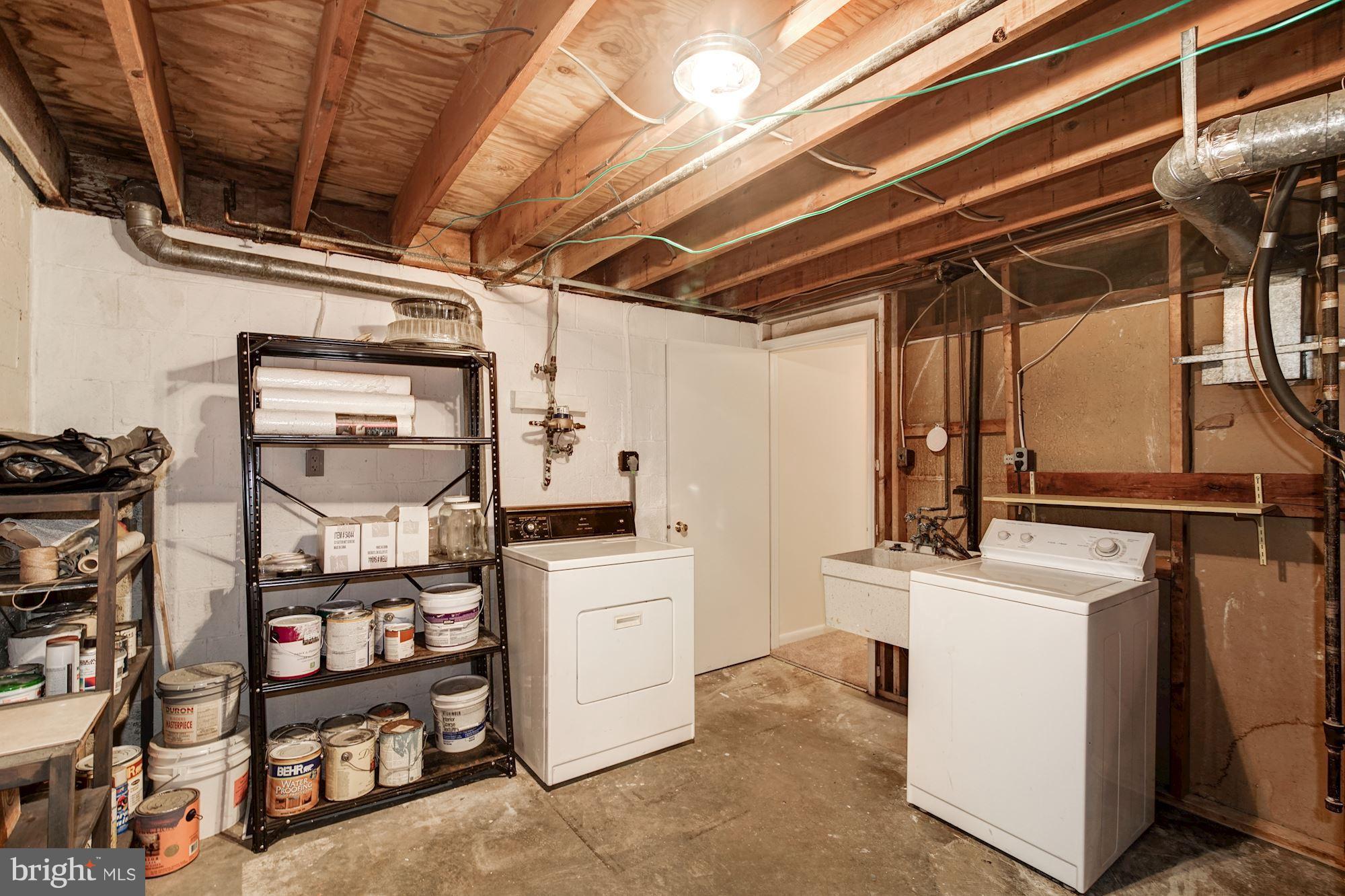 9506 Burdett Road Burke, VA 22015 - Photo 24 of 30 Laundry room with good storage.