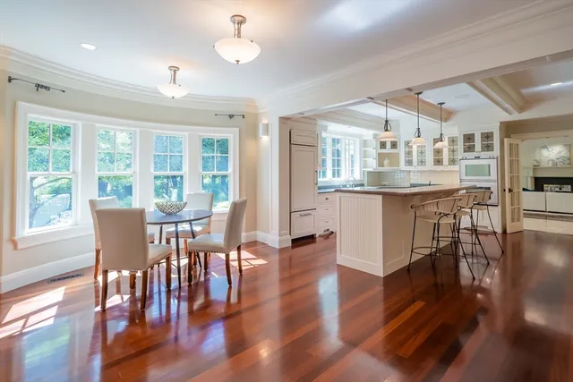 a room with lots of counter top space and windows