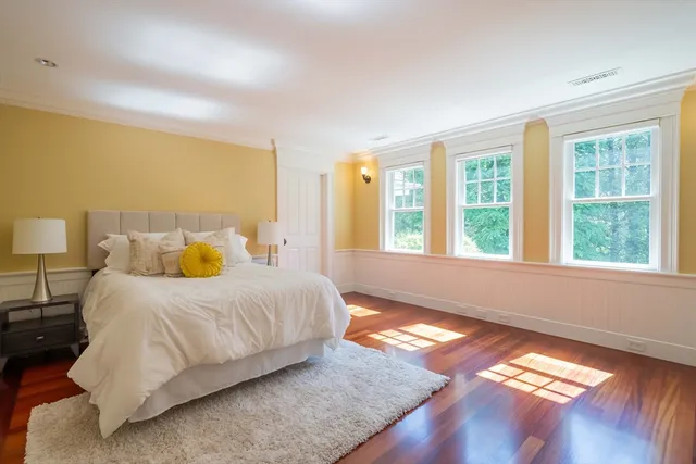 a living room with furniture and windows