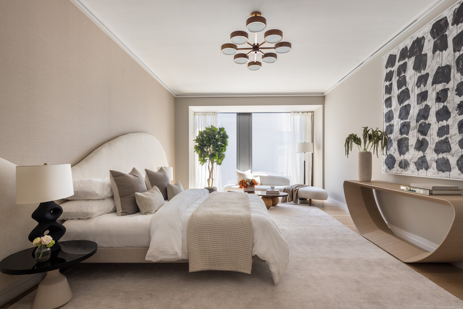 53 West 53rd Street, Unit 20D Manhattan, NY 10019 - Photo 6 of 12 a bed room with a bed and a chair