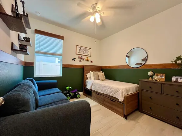a bathroom with a double vanity sink and mirror