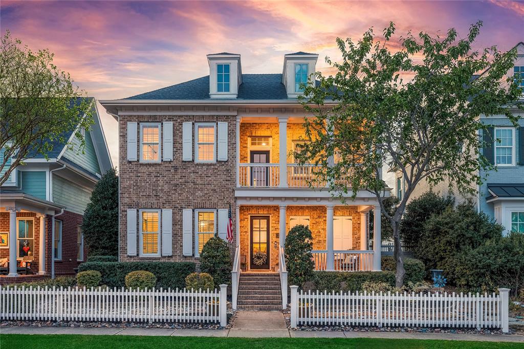 2205 State Boulevard McKinney, TX 75071 - Photo 1 of 40 a front view of a house with a garden and plants