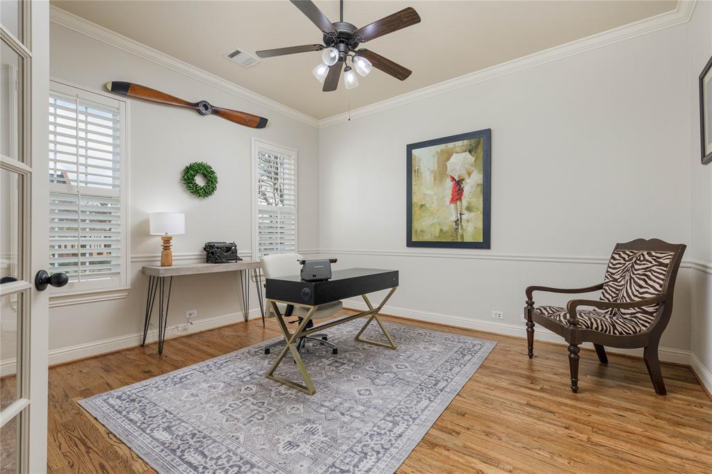 2205 State Boulevard McKinney, TX 75071 - Photo 15 of 40 a view of a workspace with furniture and a window