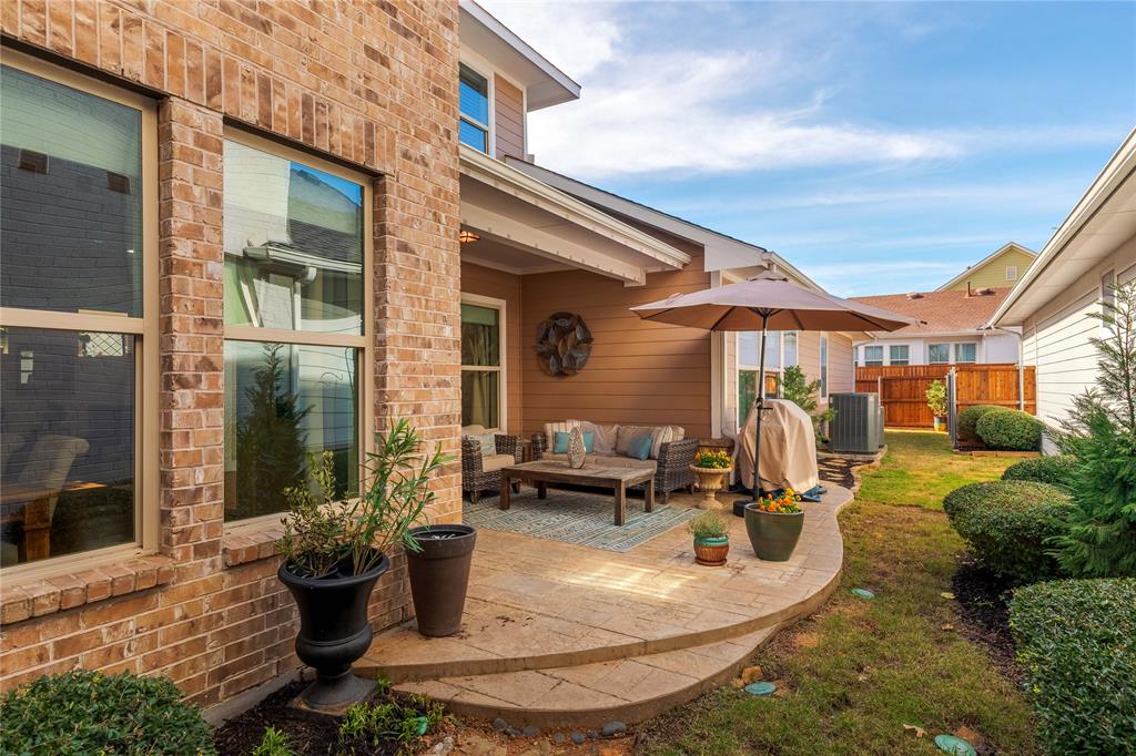 2205 State Boulevard McKinney, TX 75071 - Photo 28 of 40 a view of a house with outdoor kitchen