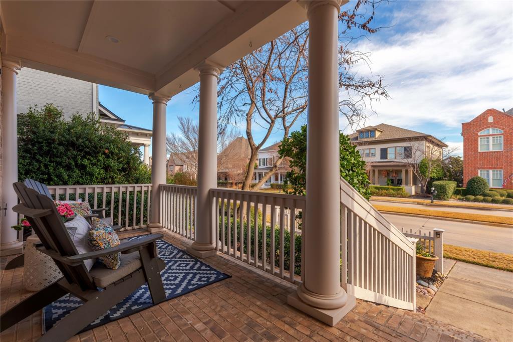 2205 State Boulevard McKinney, TX 75071 - Photo 4 of 40 Covered front porch featuring classic white columns and a brick-patterned floor