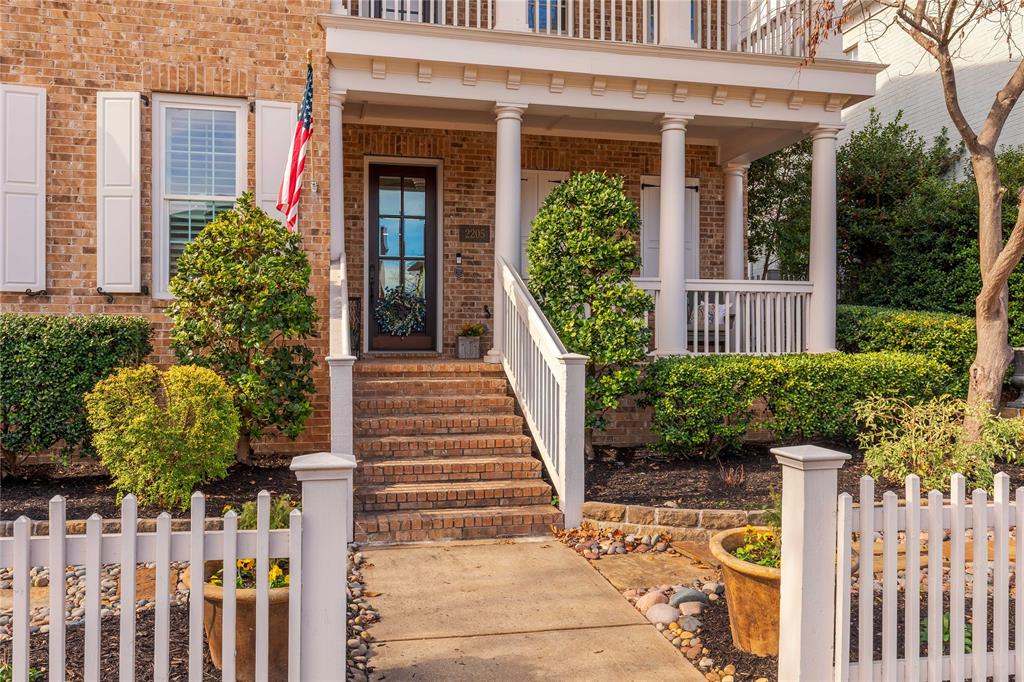 2205 State Boulevard McKinney, TX 75071 - Photo 4 of 40 a front view of a house with a garden