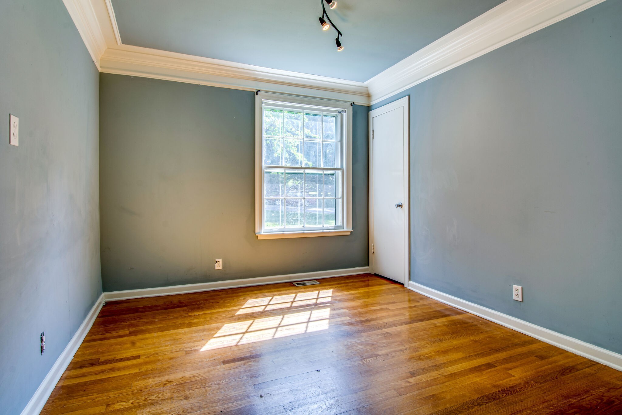 2302 Deerwood Road Nashville, TN 37214 - Photo 17 of 30 a view of empty room with wooden floor and fan