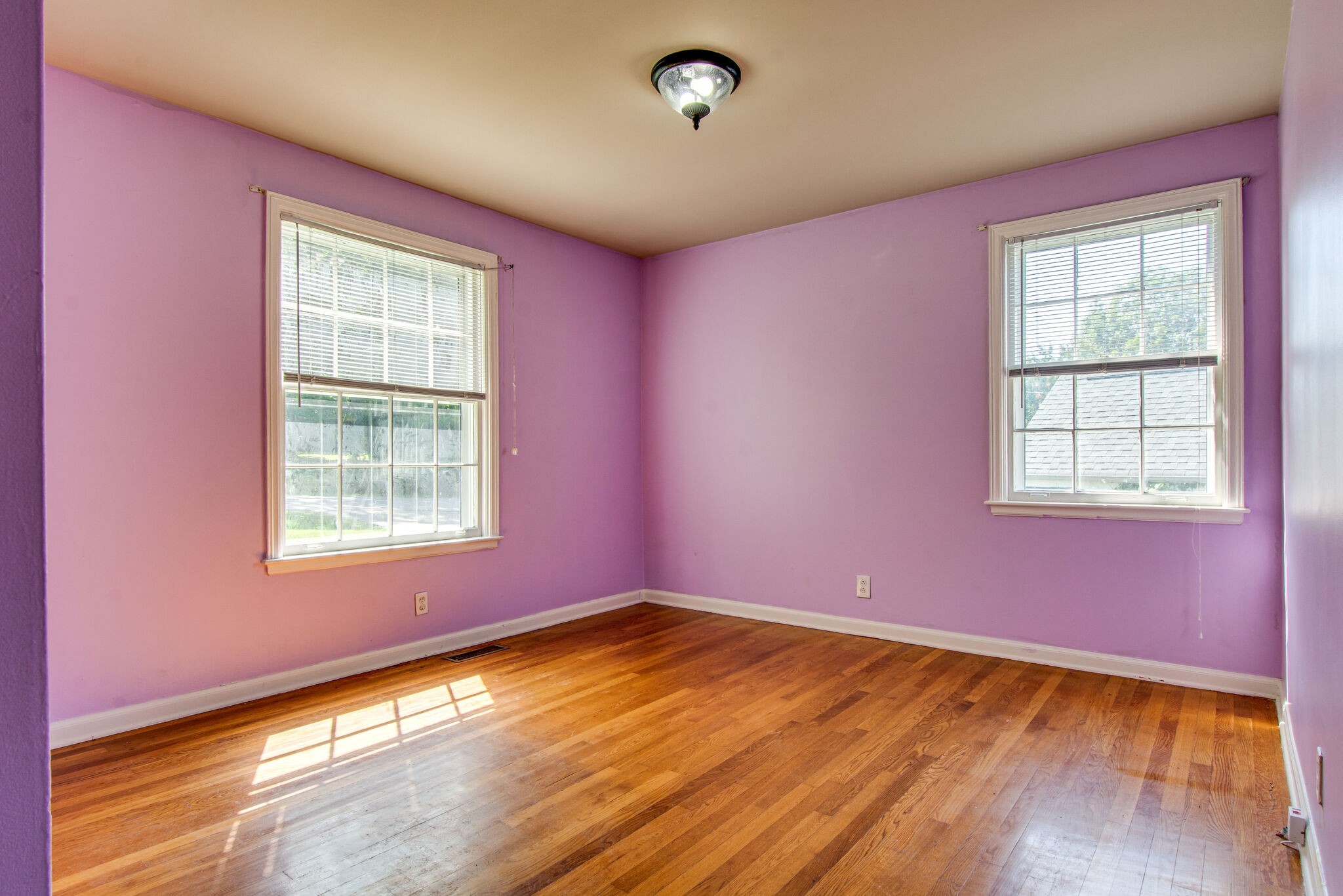 2302 Deerwood Road Nashville, TN 37214 - Photo 20 of 30 a view of empty room with wooden floor and fan