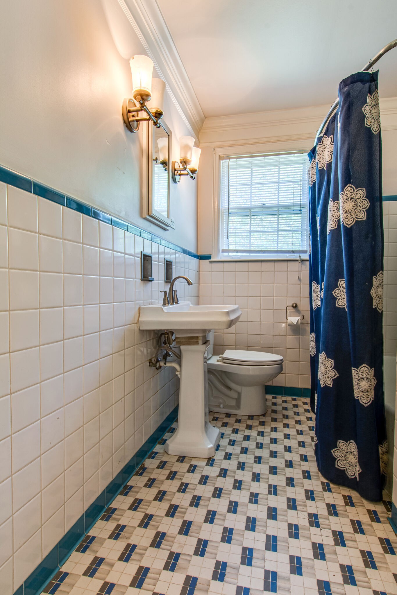 2302 Deerwood Road Nashville, TN 37214 - Photo 22 of 30 a bathroom with a sink toilet and shower