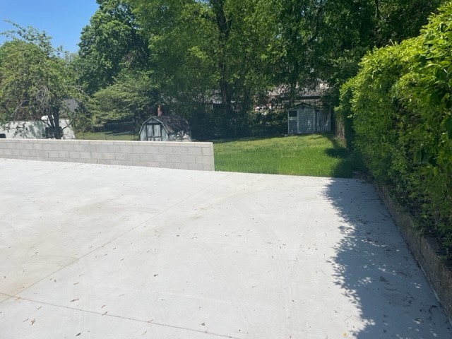 2302 Deerwood Road Nashville, TN 37214 - Photo 27 of 30 a view of a yard with a small trees