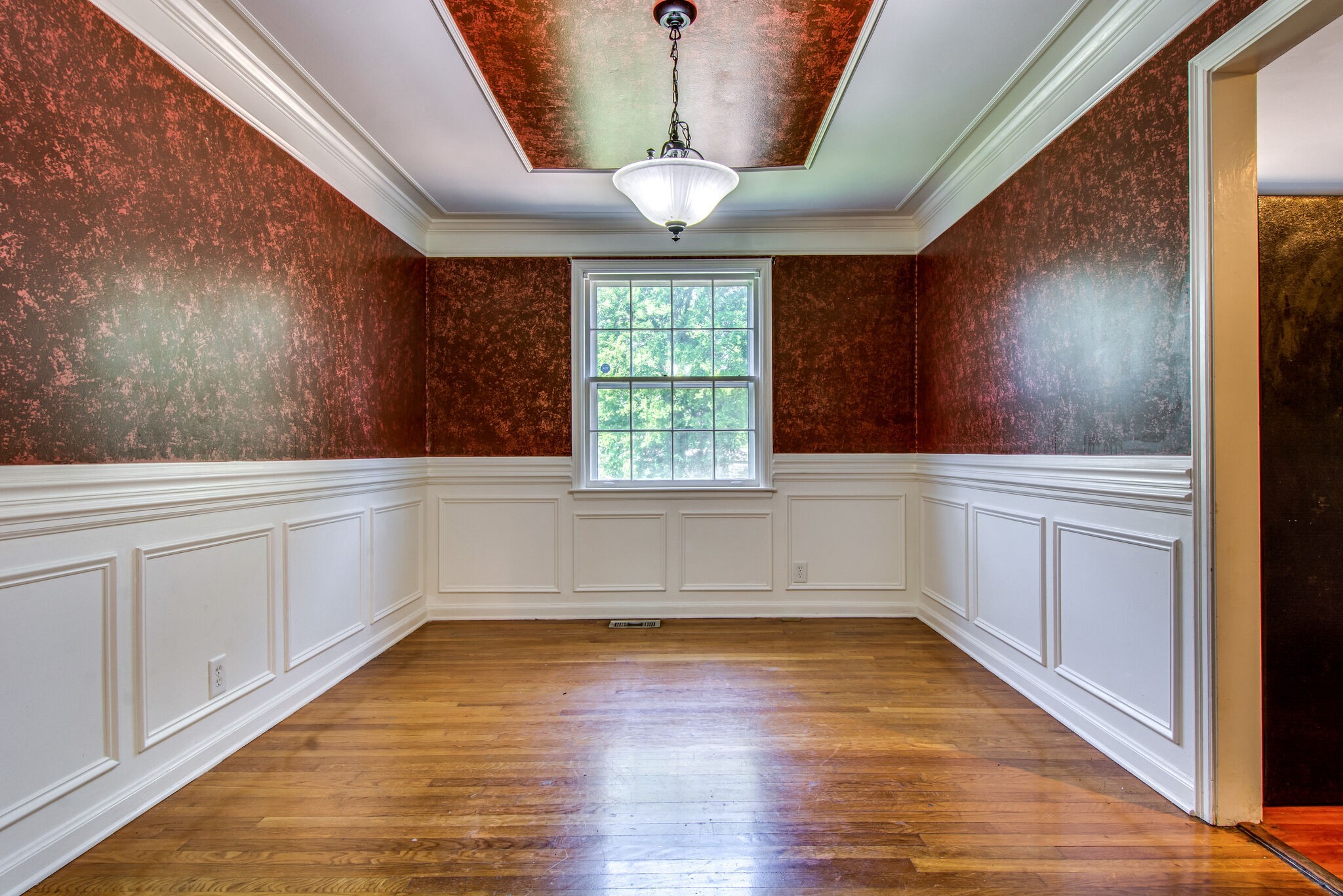 2302 Deerwood Road Nashville, TN 37214 - Photo 8 of 30 a kitchen with a window and wooden floor