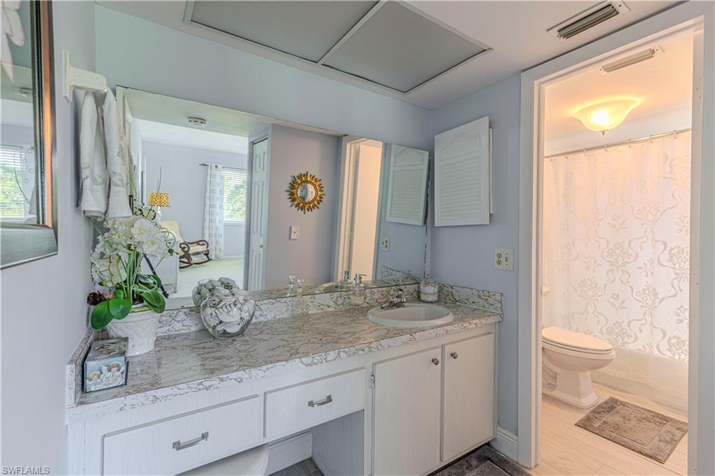 213 Memory Lane, Unit 4 Naples, FL 34112 - Photo 8 of 20 Bathroom with vanity and shower / bath combo
