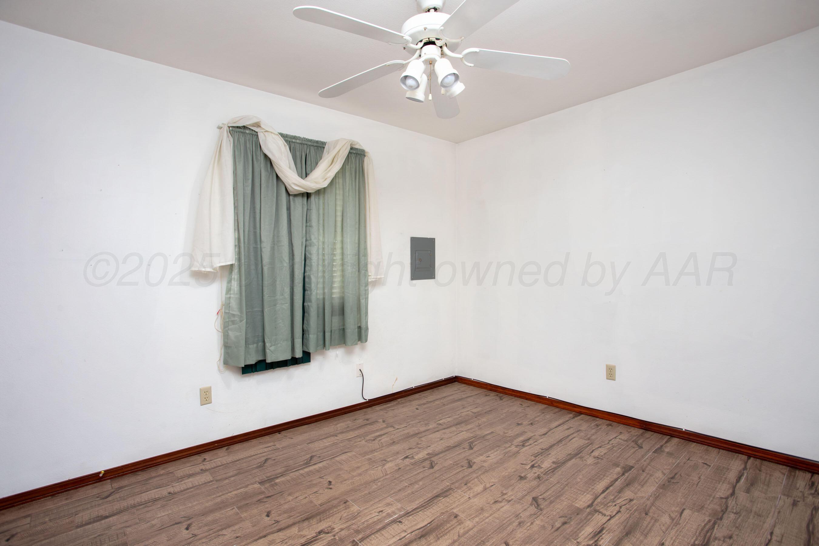 3115 Palm Street Amarillo, TX 79107 - Photo 22 of 31 wooden floor in an empty room
