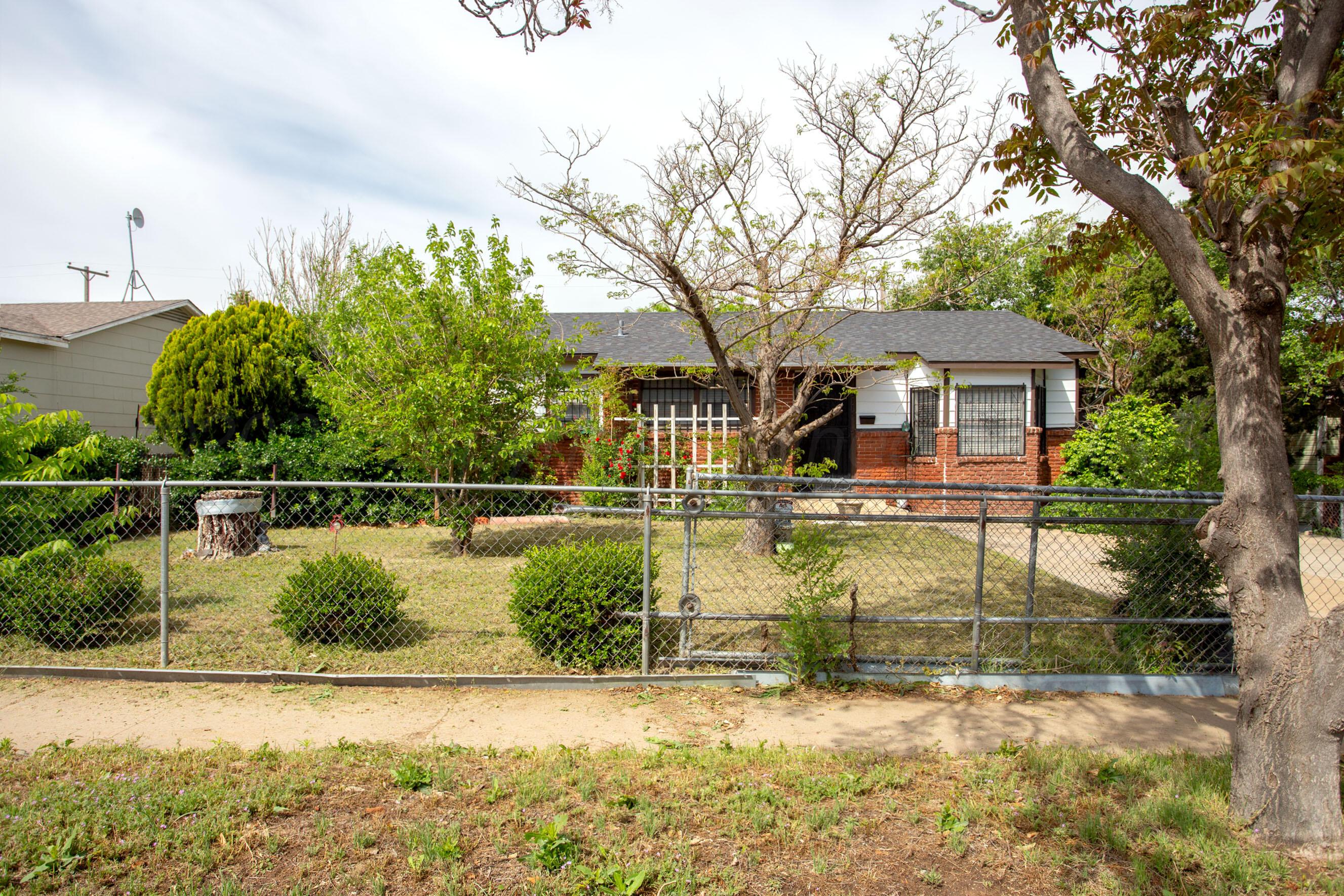 3115 Palm Street Amarillo, TX 79107 - Photo 3 of 31 a view of a house with a yard