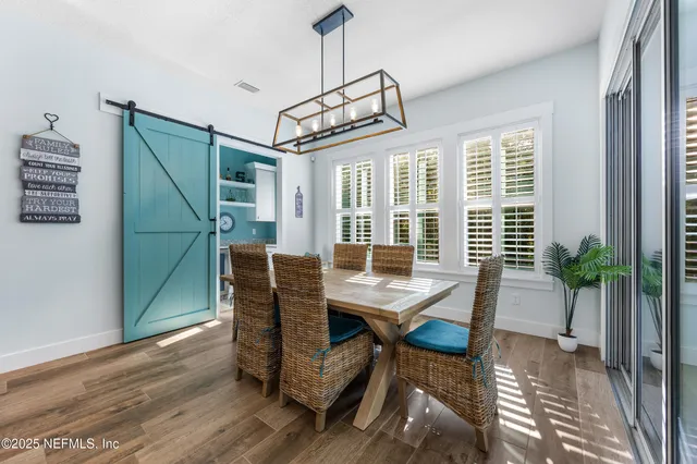 a view of a kitchen with a sink and a window