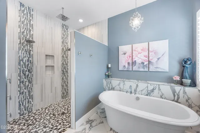 a bathroom with a shower curtain and a curtain