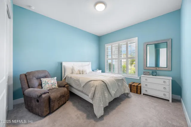 a bathroom with a toilet and a bathtub