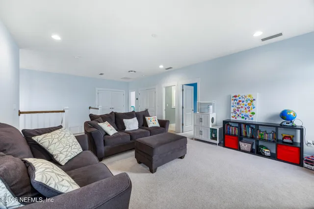 a bathroom with a sink double vanity and a mirror