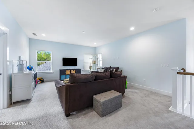 a bathroom with a sink double vanity and a mirror