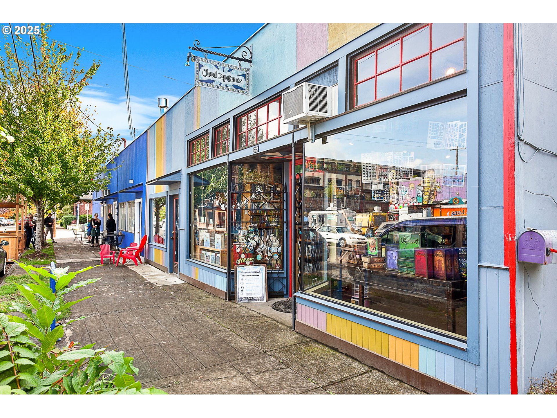 1127 Southeast Sherrett Street Portland, OR 97202 - Photo 30 of 37 a view of a building with a porch