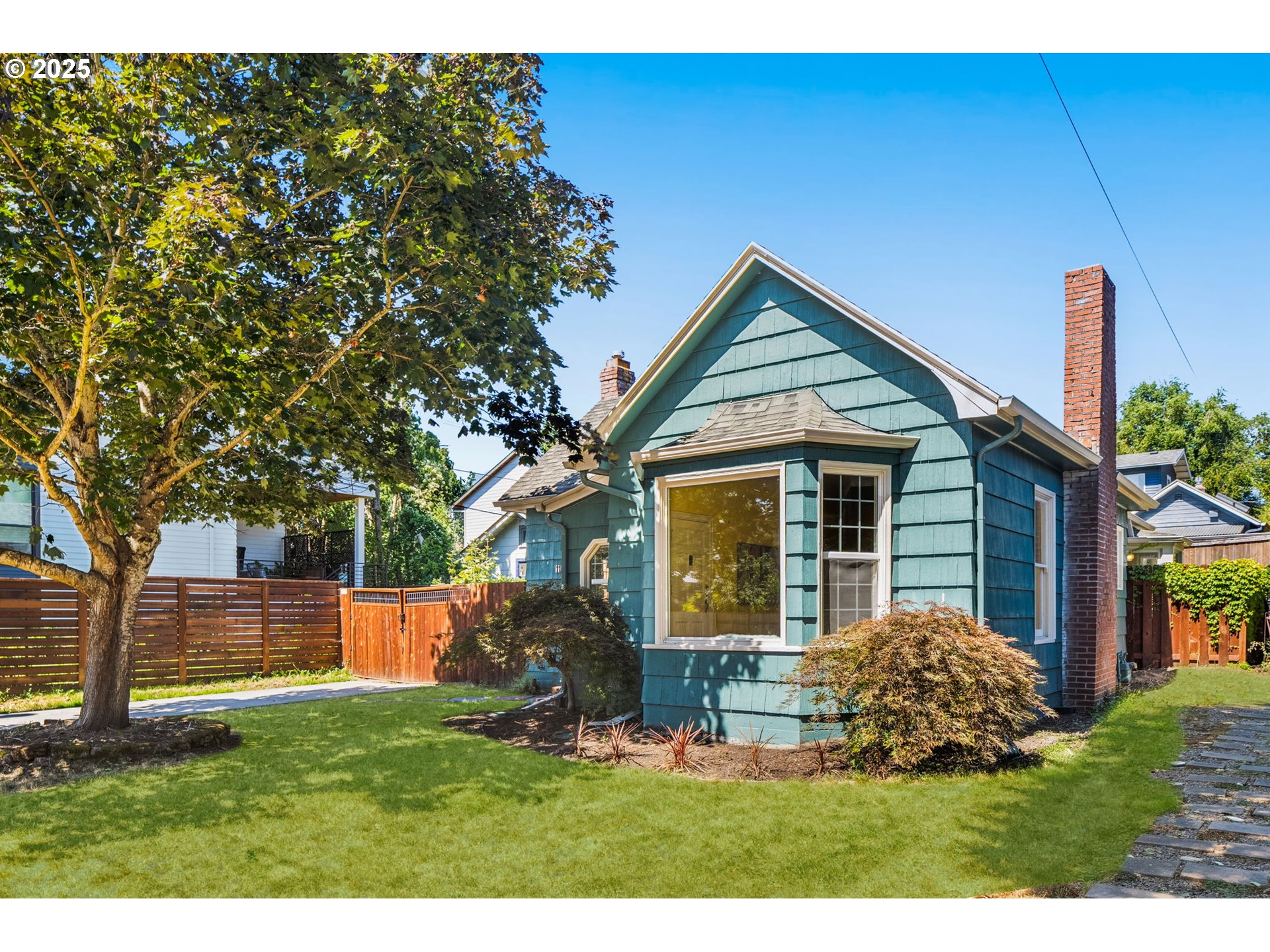 1127 Southeast Sherrett Street Portland, OR 97202 - Photo 4 of 37 a view of house with backyard