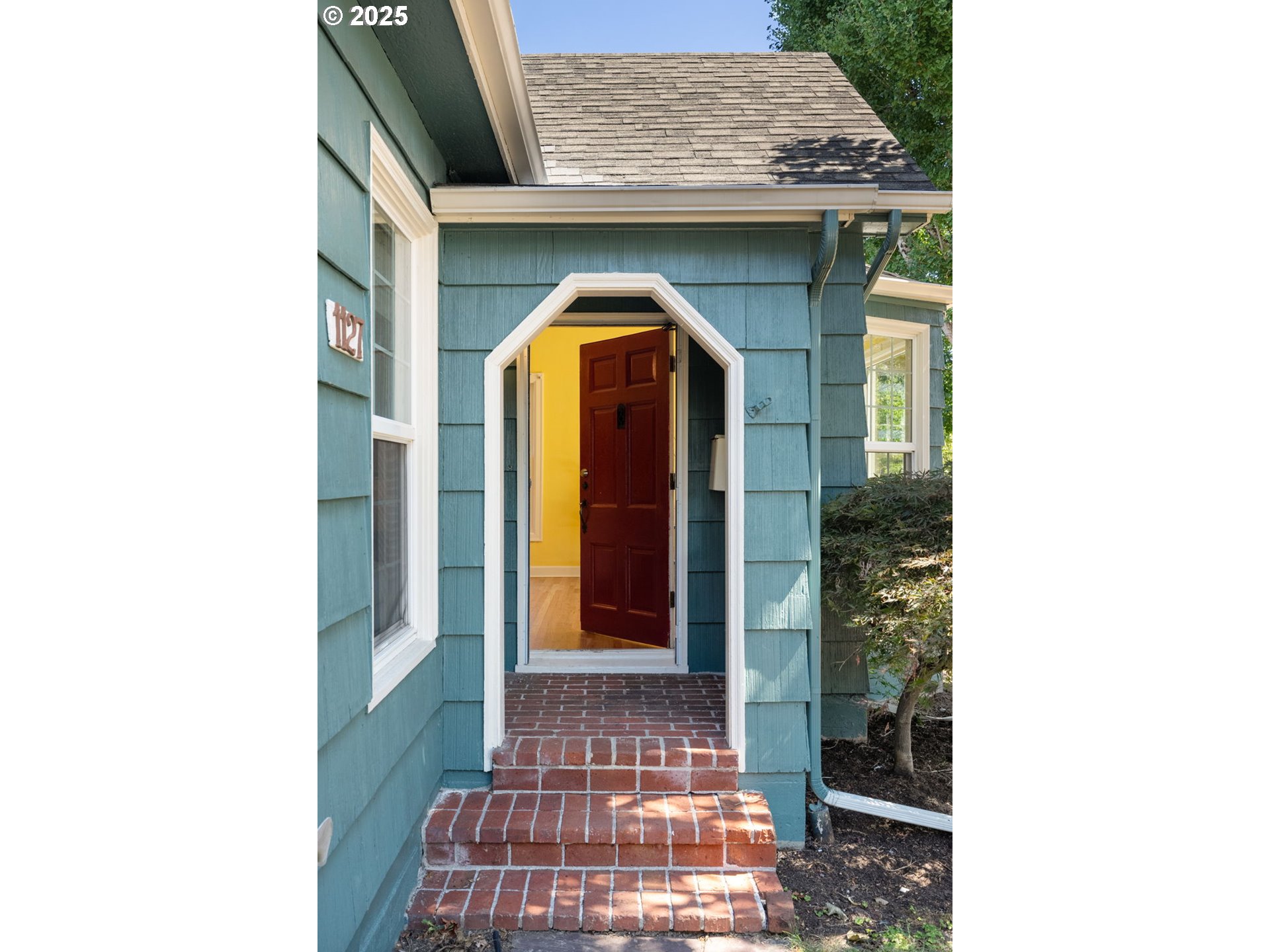 1127 Southeast Sherrett Street Portland, OR 97202 - Photo 5 of 37 a view of a wooden door of the house