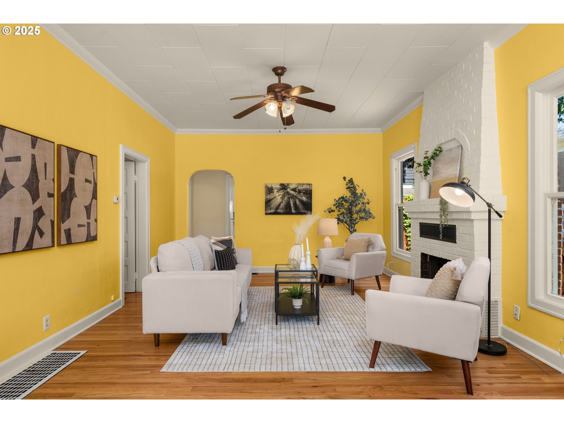 1127 Southeast Sherrett Street Portland, OR 97202 - Photo 6 of 37 a living room with furniture and a large window
