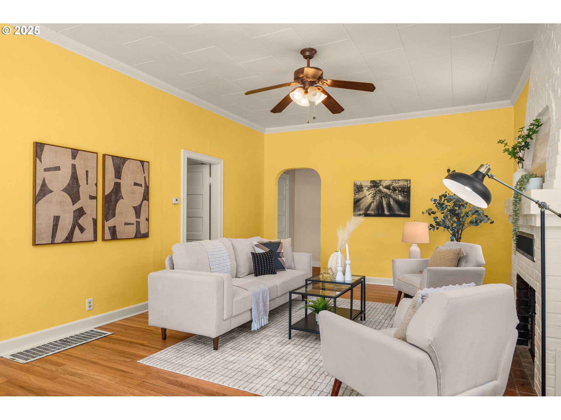 1127 Southeast Sherrett Street Portland, OR 97202 - Photo 7 of 37 a living room with furniture and a chandelier