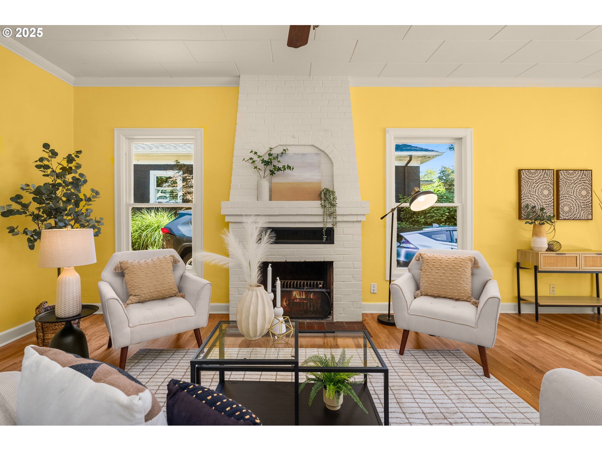 1127 Southeast Sherrett Street Portland, OR 97202 - Photo 9 of 37 a living room with furniture and a fireplace