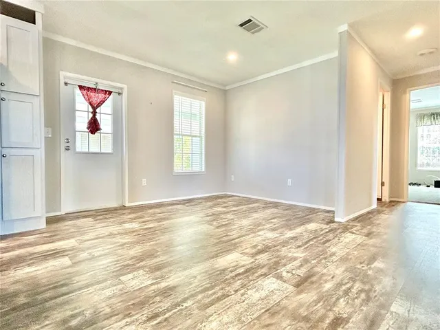 a view of an empty room and window