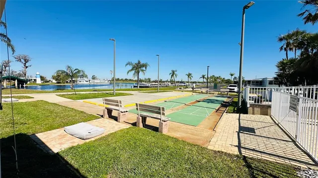 a view of a swimming pool with a lounge chairs