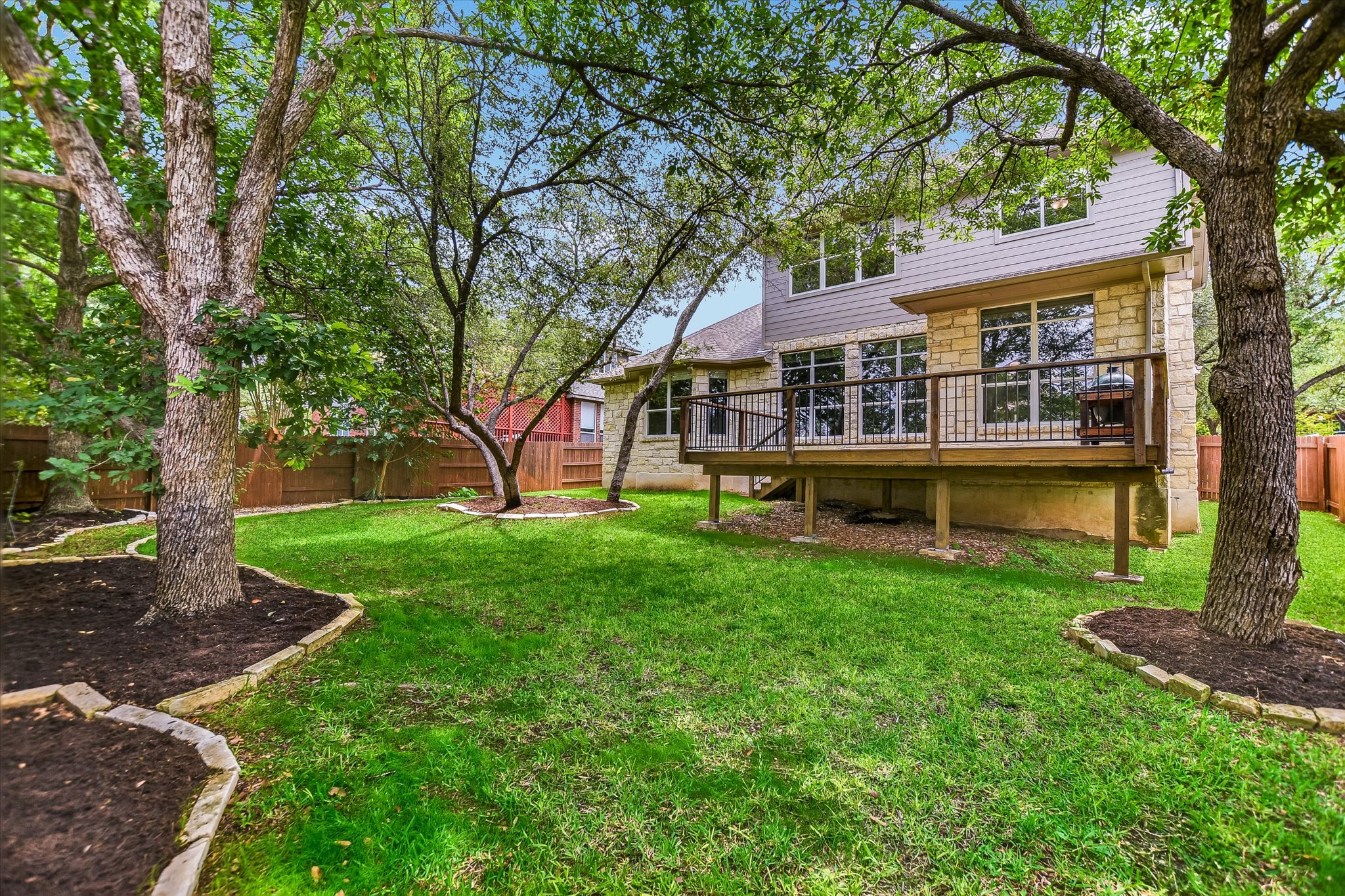 3517 Grimes Ranch Road Austin, TX 78732 - Photo 25 of 26 Landscaped Private Backyard