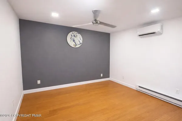 a view of a room with a fan