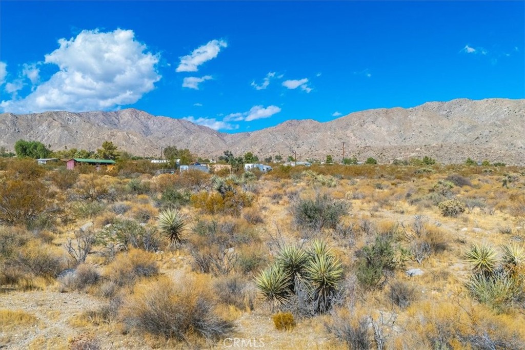 9457 Fobes Road Morongo Valley, CA 92256 - Photo 17 of 34 a view of mountain with sunset