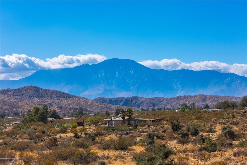9457 Fobes Road Morongo Valley, CA 92256 - Photo 2 of 34 a view of a city with mountain