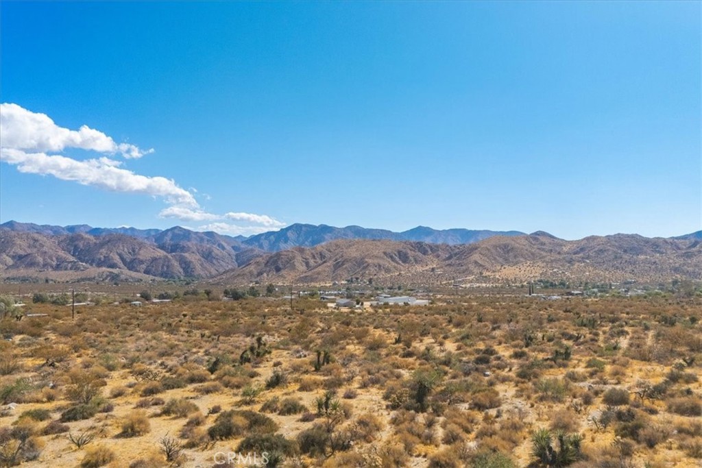 9457 Fobes Road Morongo Valley, CA 92256 - Photo 28 of 34 a view of mountain with sunset