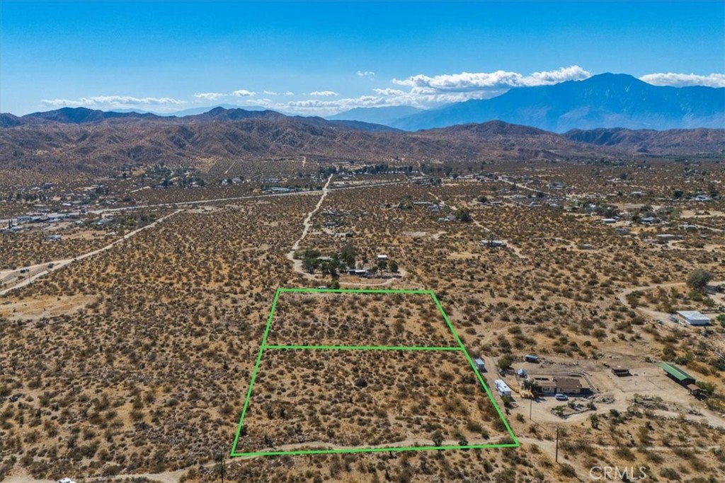 9457 Fobes Road Morongo Valley, CA 92256 - Photo 33 of 34 a view of a city with mountains in the background
